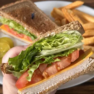 Sliced Turkey sandwich - with extra lettuce, add American cheese!  Yum!