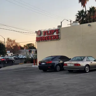 two cars parked in a parking lot