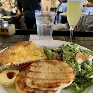 Quiche brunch special with mimosa.