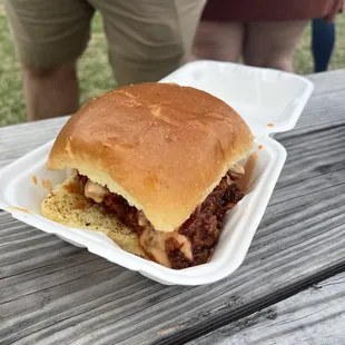 a sandwich in a styrofoam container