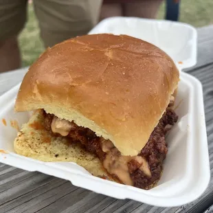 a sandwich in a styrofoam container