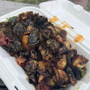 brussel sprouts in a styrofoam container