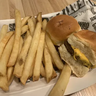 a hamburger and french fries on a tray