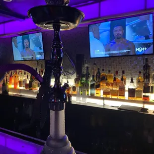 a hook smoking a hook at the bar
