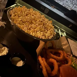 Popcorn brew house burger and onion rings