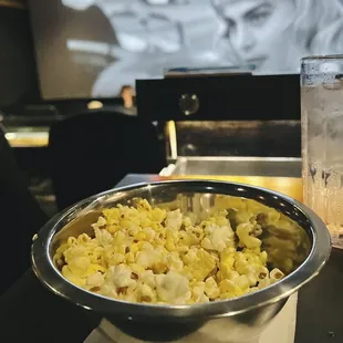 They provide you with little bowls, if you ask, so everyone in your party isn't plunging their grubby hands into one bowl of popcorn.