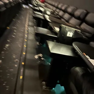 Back row seats ( the carpet has white spots it's not popcorn)