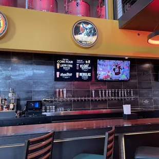 A long bar to enjoy the game.