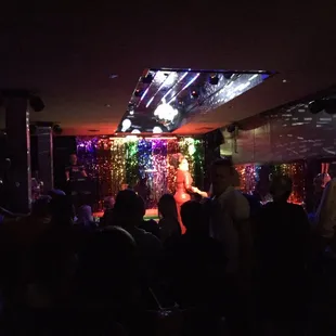 a woman on stage performing