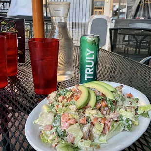 a plate of salad with avocado