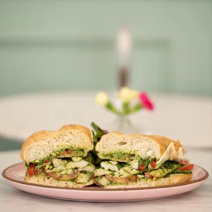 a cut in half sandwich on a plate