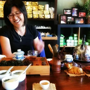 a woman sitting at a table