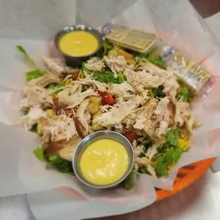Smoked Chicken Salad - Fresh Cut Romaine Lettuce, grape tomatoes, cheese, bacon bits, croutons and healthy portion of Smoked Chicken.