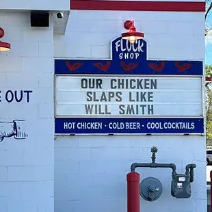 a sign for a chicken shop