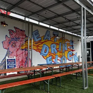 Great art work! Fun outdoor seating