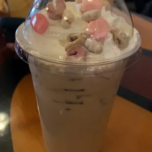 a cup of ice cream with toppings