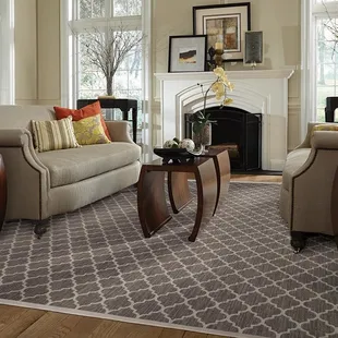 a living room with two couches and a fireplace