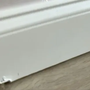 entire room must have newly installed and re-painted bases due to negligence of the floor gallery @ 12331 N Rockwell OKC