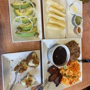 Yuca fries, avocado salad, papa relena, ropa vieja with the yellow rice. Better choice than white rice.