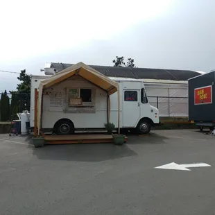 a food truck in a parking lot