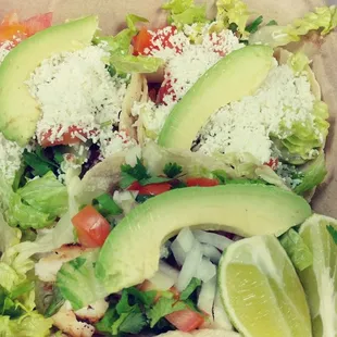 Two veggie tacos and one fish taco