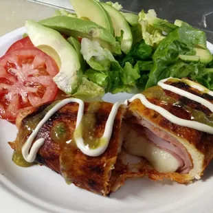 Stuffed chiquen breast with ham and oaxaca cheese.
