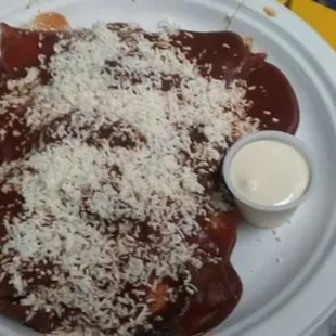 Enchiladas de mole amarillo with mushrooms.