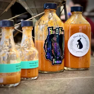 House-made Hot Sauce bottles
