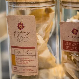 Allspicery lychee peach tea bags in a jar