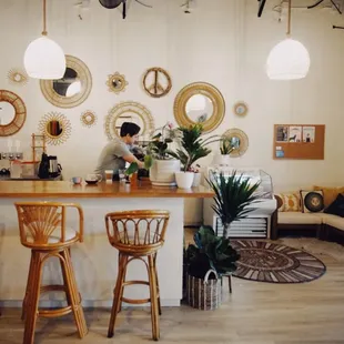a coffee shop with a bar and stools