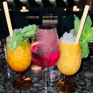 Drinks are boozy and delicious. 2 Mai Tai's and I forgot the middle drink name