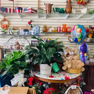 Plants, vases and stuffed animals