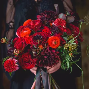 Spanish crimson monochromatic, jaw-dropping bridal bouquet.