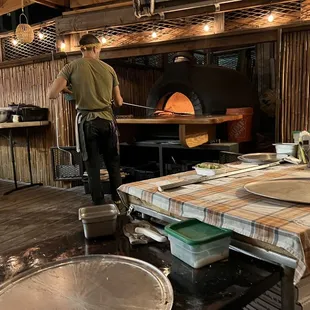 a man preparing food in a kitchen