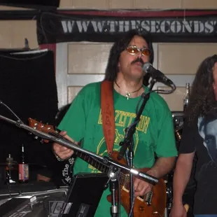 lead singers in the Elvis shirt, man that dude can wail!!