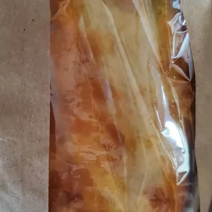a piece of bread wrapped in plastic