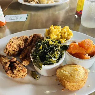 Chicken,collard greens,Mac and cheese and corn bread.