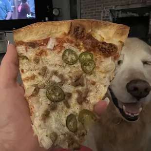 It is so amazing my Puddles wants a bite! Best pizza EVER!!
