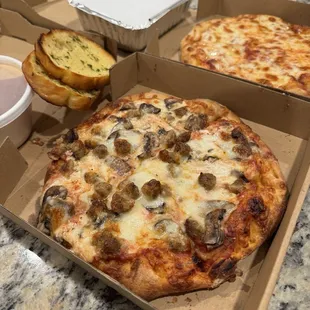 Small ricotta, sausage, mushroom.