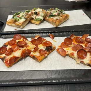 sausage and rapini on top and Pepperoni on the bottom