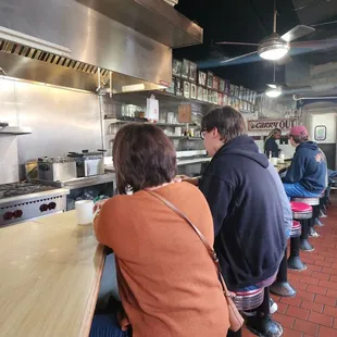 Bland/dry counter area.   No TV...no cook/servers to engage...just DRY
