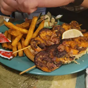 Grilled shrimp and rice lunch platter.
