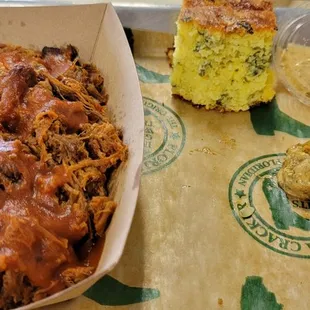 Brisket Joe, no bun, served with amazingly delicious corn bread and sorry, I dropped a pickle cuz it was so hot.