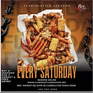 a plate of crab legs and corn on the cob