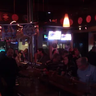 people sitting at the bar