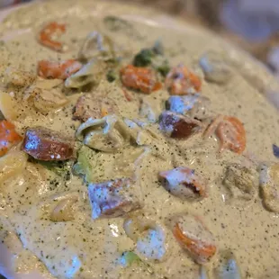 Creamy tortellini with veggies and spicy sausage