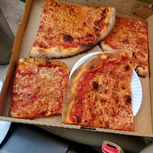 Three regular slices &amp; one sicilian slice from Florina.