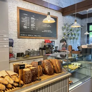 bakery counter with bread and pastries