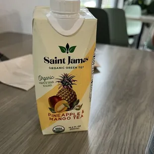 a carton of juice on a table