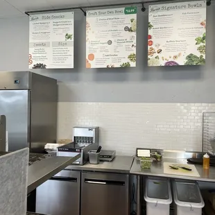 a commercial kitchen with stainless steel appliances